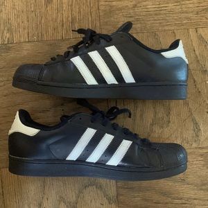 Adidas superstars, 9.5 mens, color Black with white strips gently used